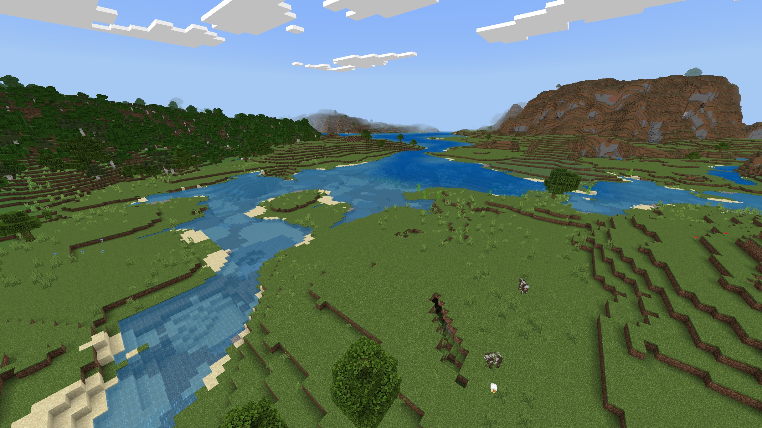 Minecraftの草原と川が広がる遠景